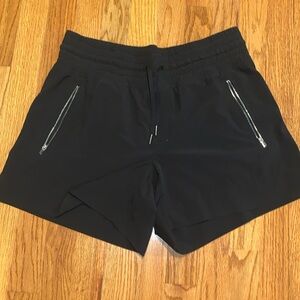 Athleta Black drawstring shorts with zipper pockets